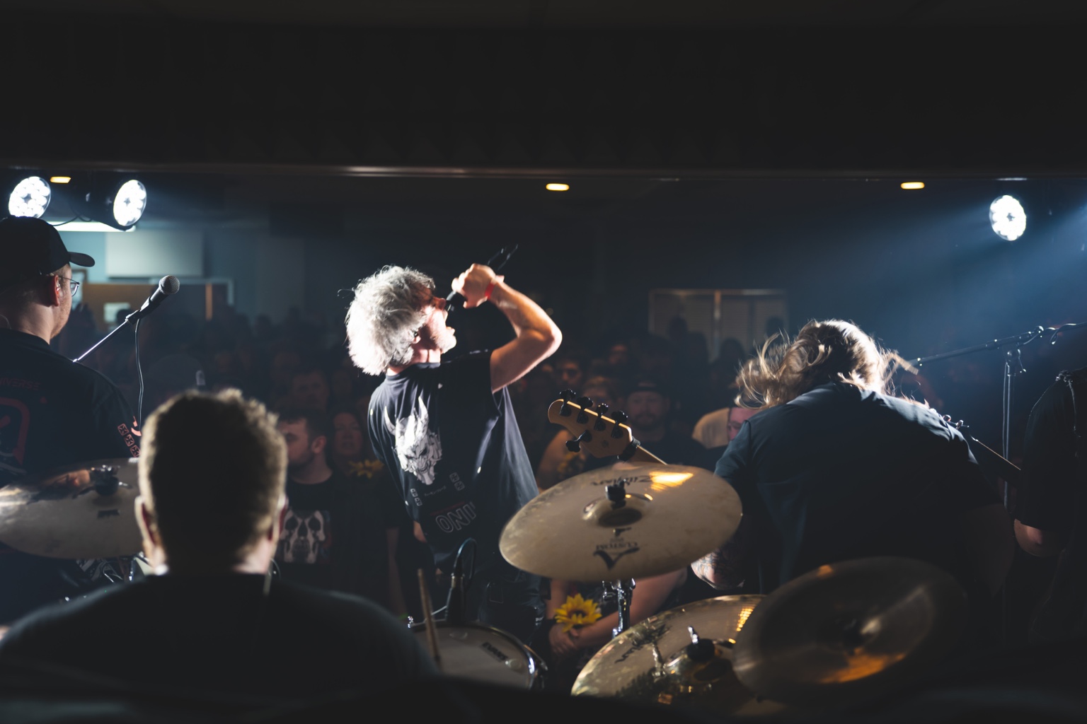 The band and crowd from behind the drums